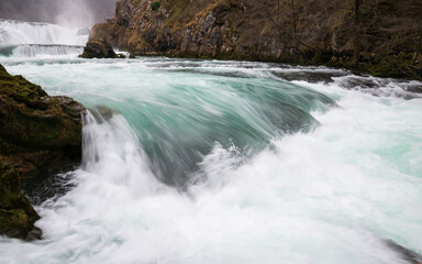 Waterfall and cascade on Una river, water sprays and flows in motion blur, turquoise colour