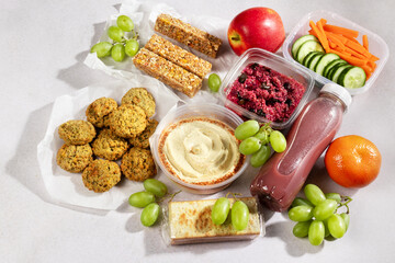 Ready prepared animal protein free quinoa salad, snack, smoothie. Quick food for lunch break, ready vegan meal overhead