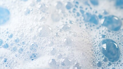 A vibrant collection of delicate bubbles forms a frothy texture, conveying a sense of refreshment and purity. This inviting foam represents the beauty of cleanliness and care