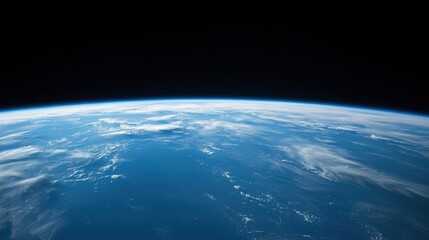 A stunning view of Earth from space, showcasing vibrant blue oceans, swirling clouds, and the curvature of the planet against a dark backdrop.