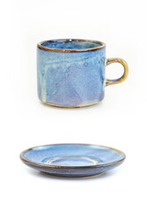 Ceramic set with blue cup and plate isolated on white