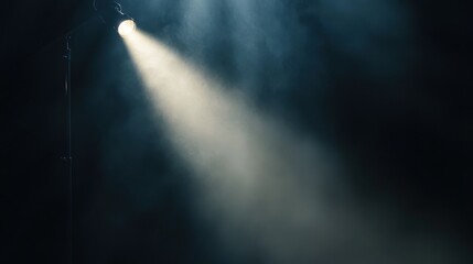 A beam of light cuts through dark smoke, creating an atmospheric and dramatic effect, evoking a sense of mystery and intrigue.