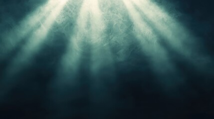 Obraz premium A serene underwater scene illuminated by soft rays of light, creating a tranquil atmosphere with a dark background.