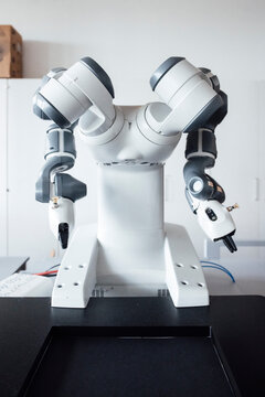 Robotic arms in a modern laboratory setting