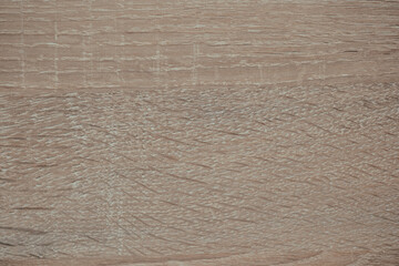 Natural wood texture with unique grain patterns in light brown hues