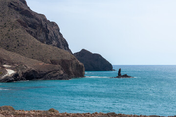 black volcanic cliffs on the Mediterranean coast