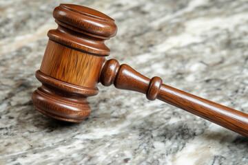 Close-Up of Judge's Gavel on Wooden Background, Symbol of Law and Justice	
