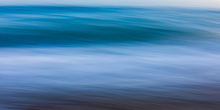 Abstract blurred seascape of the Mediterranean Sea in Menton, France
