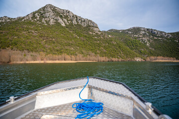 View from the boat of trees and reeds on River Crnojevica, place near Lake Skadar in Montenegro...