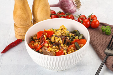 Eastern cuisine - Ptitim with beef and vegetables