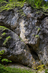 Natural landscape with rock formation and cave. Dolomite and limestone rock