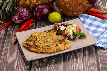 Tasty chicken steak with vegetables