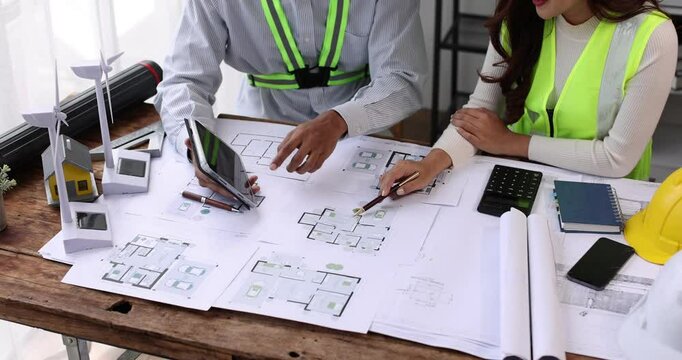 Engineer Teamwork Meeting, Architect contractor meetings of real estate brokers and company presidents to select a model to build a housing estate in writing and presenting to state organizations.	