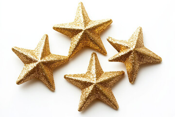 Set of shiny gold Christmas stars, placed on a white background, perfect for holiday décor

