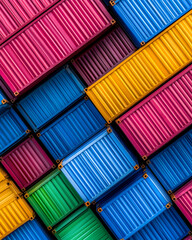 Colorful containers stacked high, industry background, logistic,shipping services