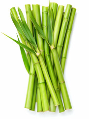 Fototapeta premium Stacked green bamboo culms with leaves isolated on white. Background for spa