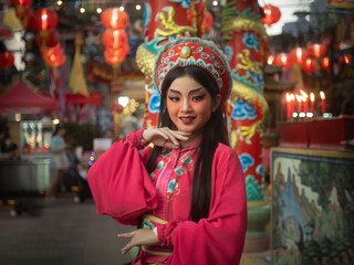 Beautiful young woman with Chinese Opera dress in Chiang Mai, Thailand.