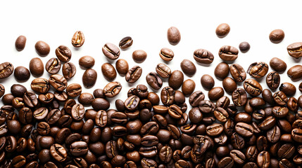 Obraz premium Close-up of assorted roasted coffee beans scattered on a white background, highlighting texture and color