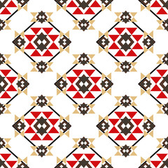 Red and brown Navajo seamless pattern with tribal geometric ornament. Native American Indian motif. Idea for rugs, curtains, carpets, textiles, and wallpaper.