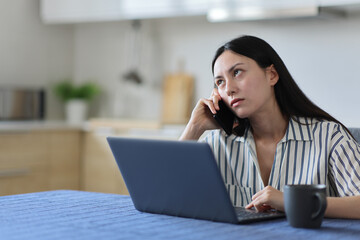 Bored woman waiting for attendance talking on phone