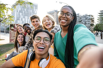 A Diverse Group of Friends Enjoying a Sunny Day Outdoors Together and Having Fun