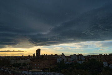 Silhouettes of the city's buildings at sunset