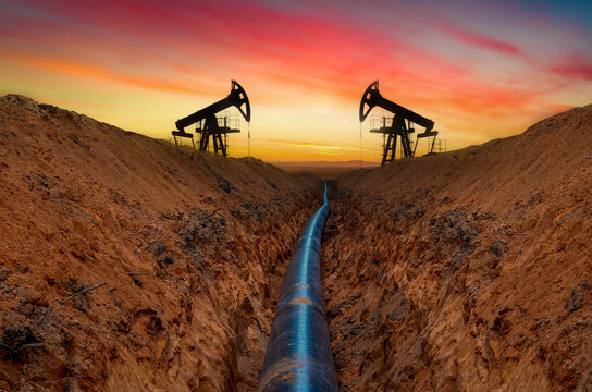 Сonstructing pipelines that transport oil, natural gas, petroleum products and industrial gases. A dug trench in the ground for the installation of industrial gas and crude pipes.