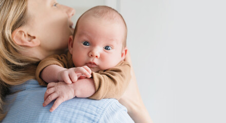 Mother and baby. Loving mom with her little one month old child