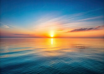 Fototapeta premium Minimalist seascape: sun-kissed waves meet golden sky.
