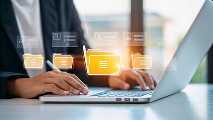 Hands Typing on Laptop with Digital File Icons Representing Data Management Concepts