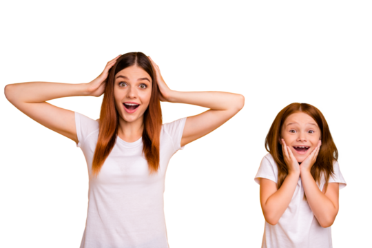 Portrait of astonished mommy and her kid with long hairstyle screaming touching head face wearing white t-shirt isolated over yellow background