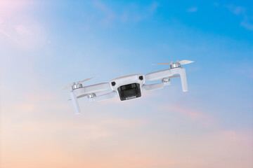 drone with camera flying in the sky