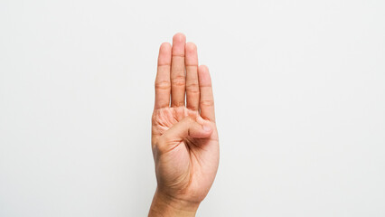 Male hand with four or promise gesture on white background