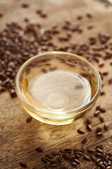 Linseeds with flax seed oil in a bowl