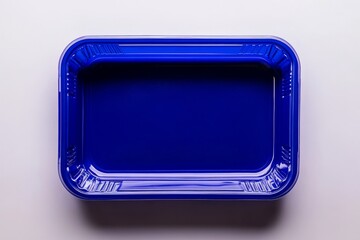 A design template featuring a top view of an empty plastic tray mockup, isolated on a white background
