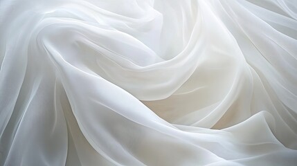 Obraz premium Flowing white chiffon fabric waves with a light, airy texture, soft transparency, and delicate natural movement.