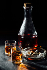 glass of whiskey and cigar