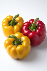 A group of colorful peppers sit on a white surface, perfect for food or kitchen-themed projects