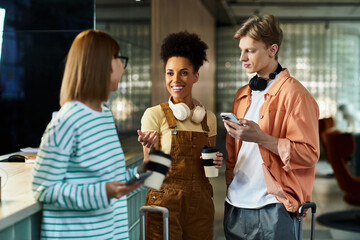 Colleagues enjoying a casual meeting at a hotel lobby during a business trip