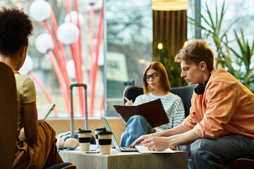 Colleagues collaborating in a hotel lounge during a business trip