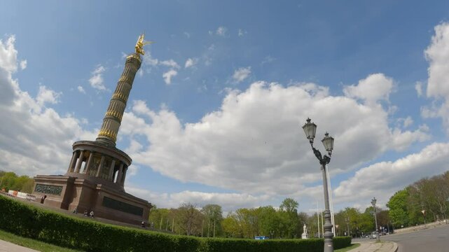 Driving on a roundabout with a view of the Victory Column in Berlin, Germany.