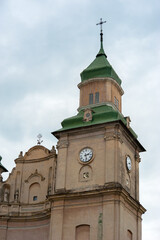 Towers with domes of the Bernardine Church in Zbarazh, clock, looking up, Ternopil region, Ukraine