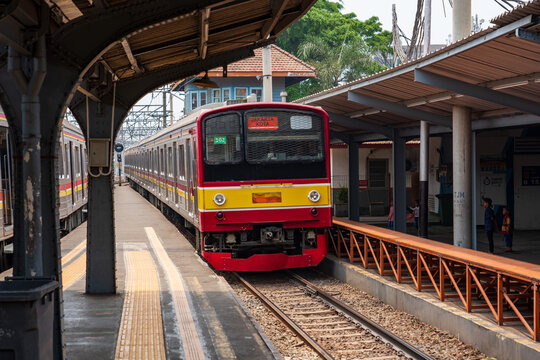 Jakarta, Indonesia - September 7 2019: Old Japanese commuter train stopping at Jakarta Kota station