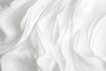 Fototapeta premium A simple black and white photo of a white cloth lying flat on a background