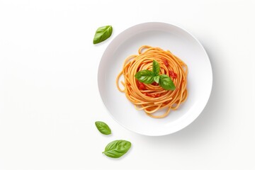 Top view of spaghetti or pasta with tomato sauce fresh basil on a white plate isolated fork