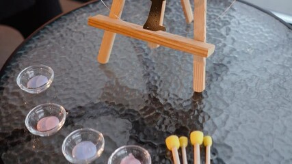 Family tree at a gender reveal party for a little new boy or girl. Pink and blue paint close up. Celebrating the birth of a baby