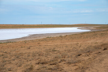 The shore of the salt lake in the steppes of Kalmykia, Russia