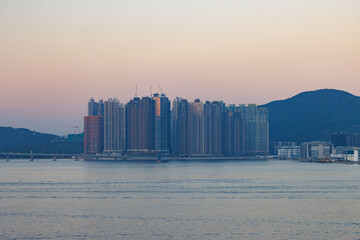 Sunset Skyline of Modern High-Rise Buildings by the Sea