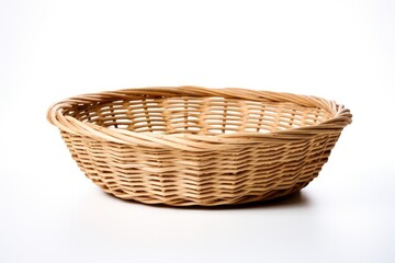 Wicker basket on blank surface