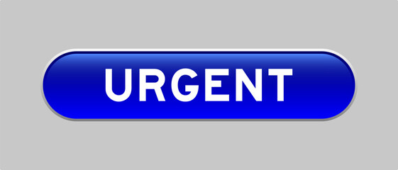 Blue color capsule shape button with word urgent on gray background